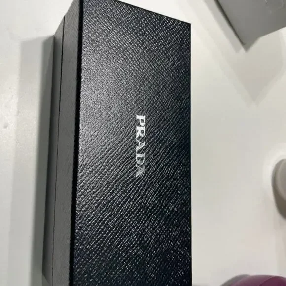 Prada 61mm Oval Sunglasses silver